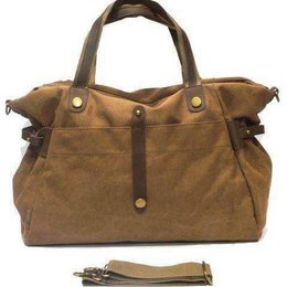 A stylish and versatile weekend bag made of durable canvas material in a variety of neutral colors including beige, khaki, blue, burgundy, camel, gray, black, olive, and green. Features a spacious main compartment, multiple pockets, and sturdy leather handles for comfortable carrying.