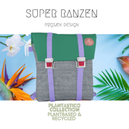 A lilac-colored denim school bag with a plant-based and recycled design. The bag features a rectangular shape, green and purple accents, and adjustable straps for comfortable carrying.