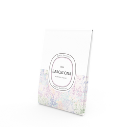 Scented sachet with rose fragrance from the Barcelona Collection. The sachet has a floral pattern design and is packaged in a decorative box.