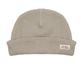 Soft, cozy green baby hat with ribbed texture. Suitable for infants aged 0-12 months.