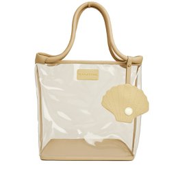  Large pink beach bag with woven texture and handles. Suitable for carrying beach essentials and storing items.