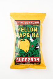 Yellow paprika flavored potato crisps in a 135g package.