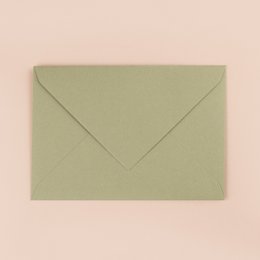 Olive green envelope with a handwritten note and a pen, suitable for cards or invitations.