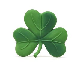 Green clover-shaped teething toy for babies. Made of soft, safe materials. Helps soothe gums during teething process.
