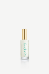 "Clear glass bottle with gold cap, green text label, lightweight serum packaging, minimalist skincare design"