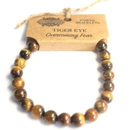 This bracelet features round tiger eye beads in shades of brown and yellow, creating a natural and earthy look. The bracelet has a simple, minimalist design that would complement a variety of casual outfits.