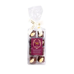  Marzipan gingerbread pralines cup, a delightful treat featuring a round, tall cup-shaped praline with a gingerbread flavor and marzipan texture.