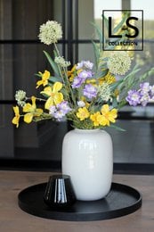 A round, 40cm wooden tray in a matte black finish, suitable for use as a candle tray, serving board, or home decor.