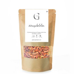 Everyday HELDIN tea, a blend of black tea, coconut, and pineapple pieces. The tea has a warm, tropical flavor with notes of sweetness from the coconut and pineapple.