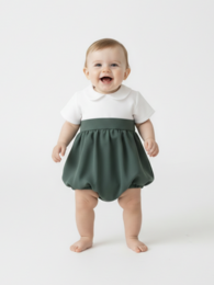  Soft green baby romper with short sleeves and a flared skirt. Suitable for infants aged 0-18 months.