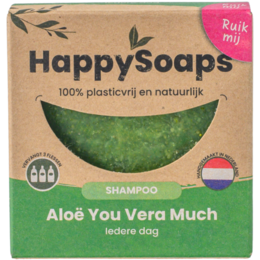 Green, round shampoo bar with "Happy Soap" text. Solid, natural shampoo bar for cleansing hair.