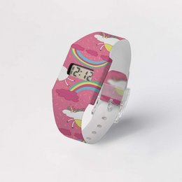 A digital wristwatch made of Tyvek® with a unicorn and cloud design. Features a paperlike watch face and cardboard-like construction.