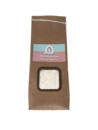 A basic baking mix for dough, packaged in a brown paper bag with a label featuring a light blue and pink color scheme.