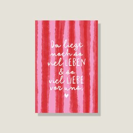 A red and pink striped postcard with the text "I love doing life with you" printed on it. The postcard appears to be a friendship or greeting card.