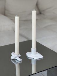 Candlestick in the shape of a knot