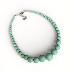  Mint green beaded necklace, round gemstone beads, nature-inspired jewelry, graduated bead sizes, elegant chain accessory.