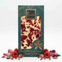 Premium white chocolate bar with raspberry and rose flavors, handmade in Austria.