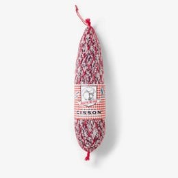 A decorative sausage with a red and white checkered pattern, featuring a graphic of a sheep and the text "Maison Cisson" on the packaging.