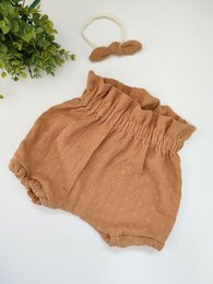 Brown embroidered muslin high waist bloomers for kids, available in sizes newborn to 18 months. Features a loose, relaxed fit and ruffled waistband.