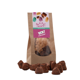  Chocolate truffles in a paper bag, labeled "Parisian Macaron - Chocolate Truffles - 130g". The truffles appear to be dark chocolate in color, with a smooth, glossy finish. The packaging has a rustic, artisanal design.