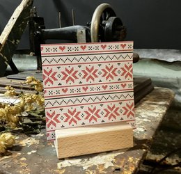  A warm winter-themed thank you card with a festive, Nordic-inspired pattern in red and white.