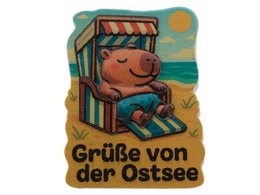 A small, white, fluffy sheep figurine with a round body and short legs, sitting on a grassy base.