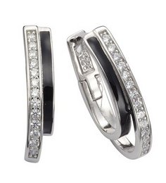 Silver-tone hoop earrings with a row of sparkling crystals along the outer edge.