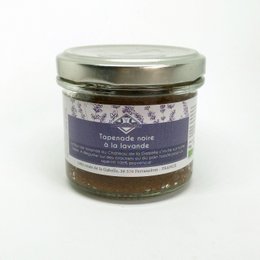 Black tapenade with organic lavender flower, a savory spread with a rich, earthy flavor and floral notes from the lavender.