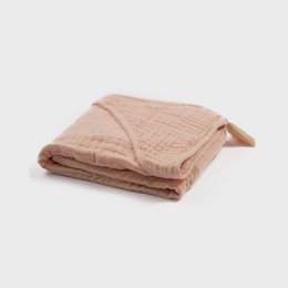 Soft, organic muslin baby hooded towel in a salmon color. Made of high-quality cotton for gentle drying and warmth after bath time.