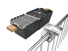 Metal balcony railing bracket with grill attachment for barbecue use. Rectangular shape, black color, made of durable steel material.
