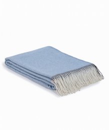  Soft, cozy blue merino/cashmere throw with fringed edges, perfect for snuggling up on the couch.