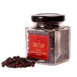  Dark brown peppercorns in a glass jar labeled "SALTSUP". The peppercorns appear whole and unground.