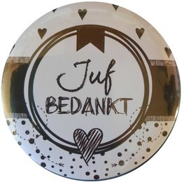 A round black and white makeup mirror with the text "Juf bedankt" (Dutch for "Thank you teacher") printed on it.