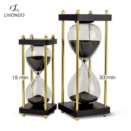 Edle Sanduhr Chronometrie I Dekorative Sanduhr aus Glas mit feinem schwarz-schimmernden Sand veredelt mit goldenen Seitstützen