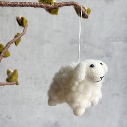  Soft, fluffy white sheep ornament for Easter decoration.