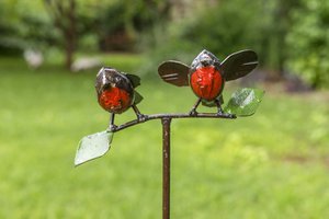 Zimba-Arts METALEN PAAR BABY ROBIN OP STOKBLADEREN