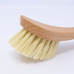 Wooden dish brush with beech handle and natural fiber bristles. Curved shape for easy cleaning of dishes, pots, and pans.