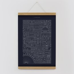 A black and white print featuring a detailed cityscape design with various architectural elements and geometric shapes.
