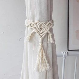 Cream hand-woven cotton curtain tieback with macramé heart pattern and tassel fringe, bohemian style.
