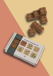 Eco-friendly cork building blocks in a natural, earthy color palette. Suitable for kids' imaginative play.