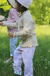 Pink summer pants with floral print for kids, available in sizes 98 (age 3), 92 (age 2), 104 (age 4), and 116 (age 6).