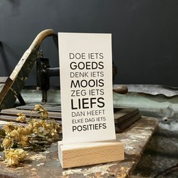  A simple, minimalist thank you card with the text "Does it gods, moons, liefs, posities" printed on a white background.