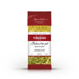 Trofiette pasta with pesto genovese. Long, thin, yellow pasta noodles in a green pesto sauce.