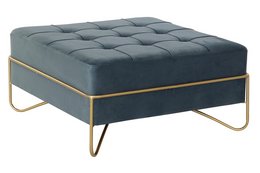 A square, tufted footstool with a dark gray velvet upholstery and gold-colored metal frame. The footstool has a modern, minimalist design and appears to be suitable for use as extra seating or a coffee table.