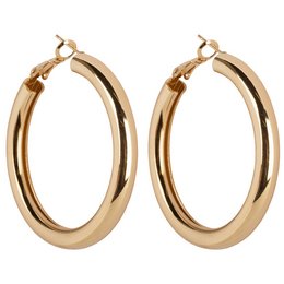 Coco Hoops are a pair of classic gold-tone hoop earrings. The hoops have a smooth, rounded shape and a shiny, polished finish. These versatile earrings can be worn for a range of occasions, from casual to formal.