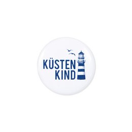 A round button with the text "Kusten Kind" in blue and white, indicating a children's product.