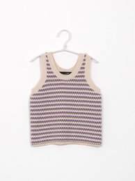 A striped sleeveless top for kids, featuring a pink and white zigzag pattern. The top is suitable for children aged 2-10 years old.