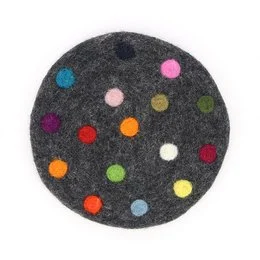 Felt coasters with colorful polka dot design, suitable for use as trivets.