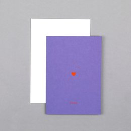 A simple, elegant thank you card with a small heart design in a vibrant color against a plain purple background.