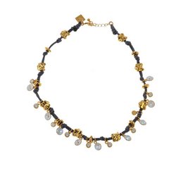 Classic white necklace with gold and crystal accents. Elegant and versatile chain necklace suitable for everyday wear or special occasions.